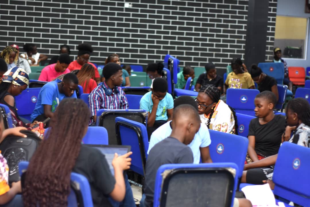 Learners working in supervised breakout groups during a JENECONK AI bootcamp