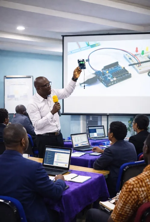 JENECONK instructor leading a practical technology class