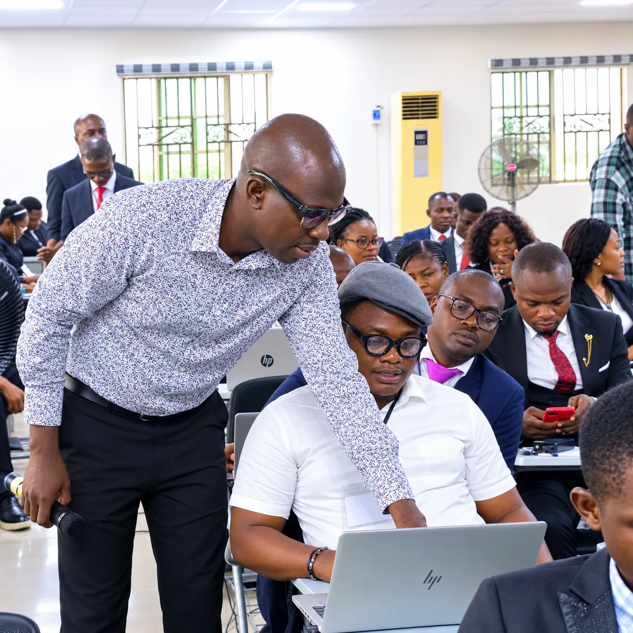 JENECONK facilitator guiding an administrator during practical AI Workbench training